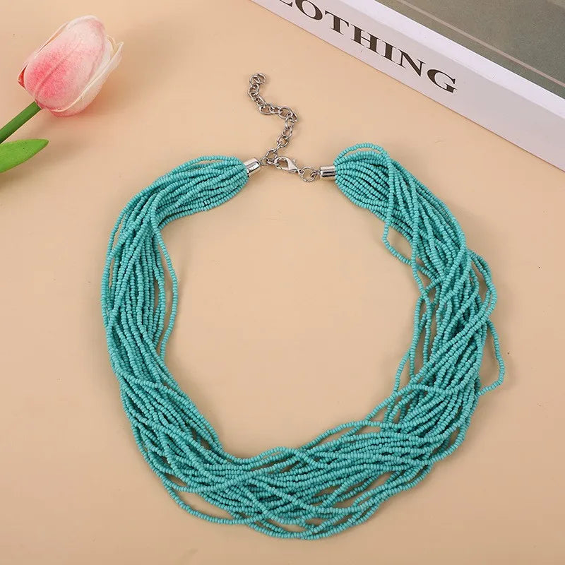 A fashionable multi-layered necklace with a simple and elegant feminine charm. A retro and exaggerated collarbone chain