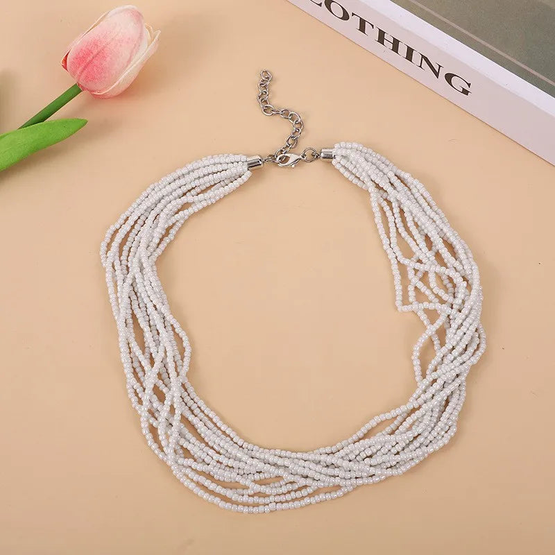 A fashionable multi-layered necklace with a simple and elegant feminine charm. A retro and exaggerated collarbone chain